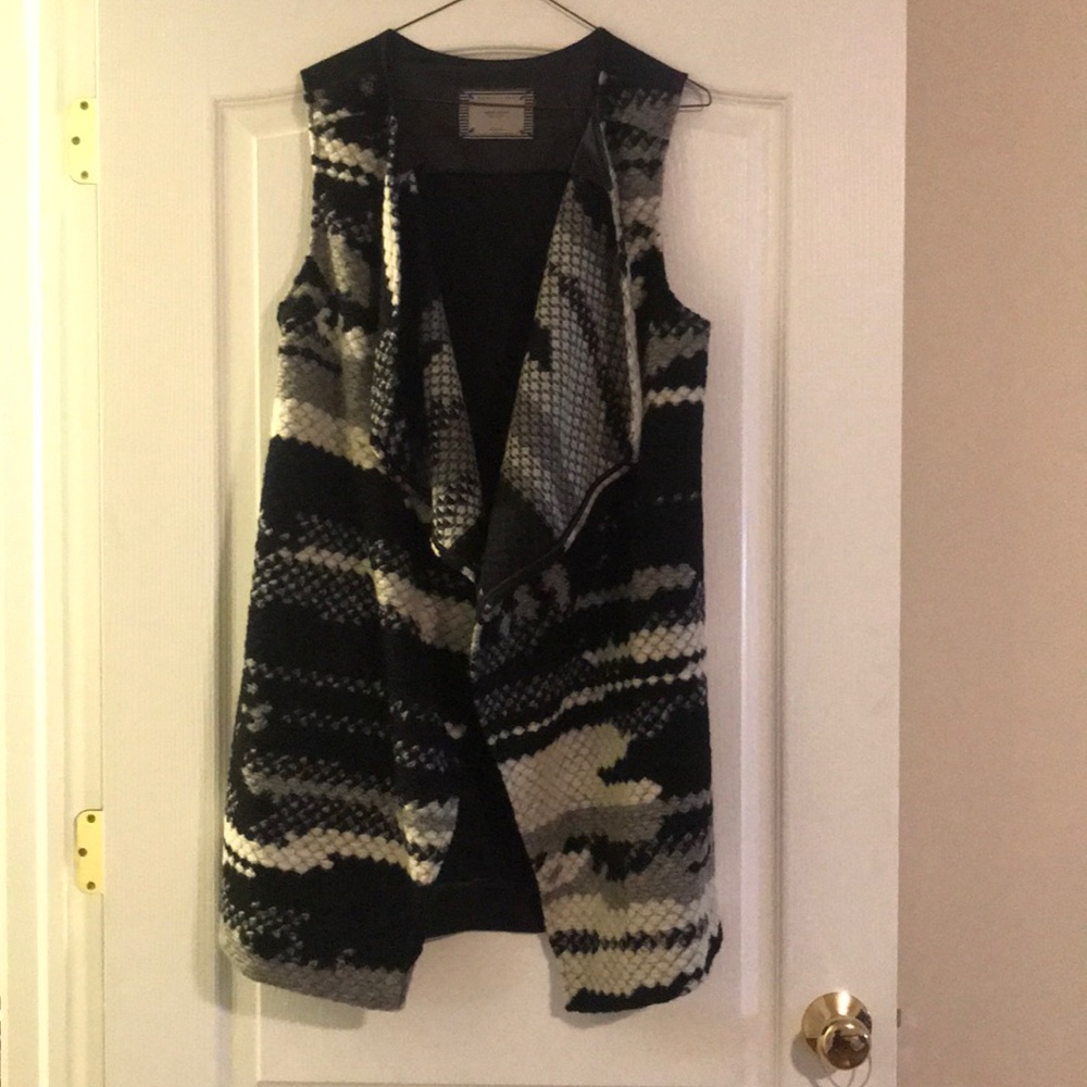 Warm black, white and gray vest
